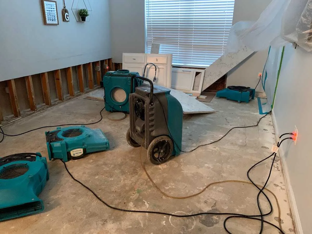Dehumidifier in flood-cut room for Water Damage Restoration in Lake Wisconsin